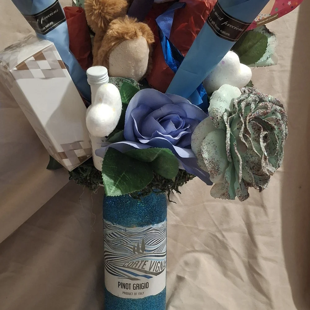 Blue Glitter Wine Bottle with Floral Display